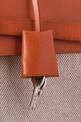 Lot 52 - An Hermès canvas and natural leather Herbag, modern