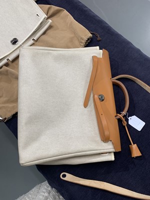 Lot 52 - An Hermès canvas and natural leather Herbag, modern