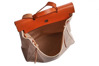 Lot 52 - An Hermès canvas and natural leather Herbag, modern