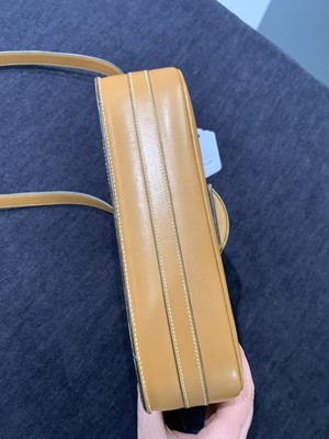 Lot 53 - An Hermès canvas and natural leather shoulder bag, 1960s
