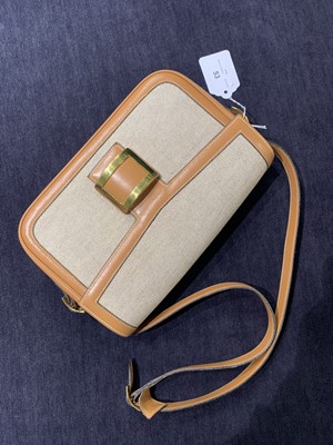 Lot 53 - An Hermès canvas and natural leather shoulder bag, 1960s