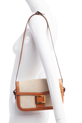 Lot 53 - An Hermès canvas and natural leather shoulder bag, 1960s