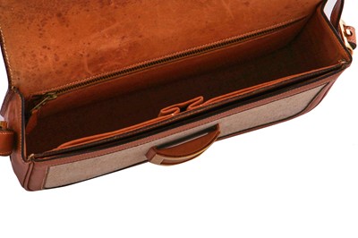Lot 53 - An Hermès canvas and natural leather shoulder bag, 1960s