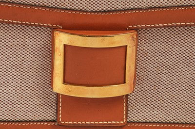 Lot 53 - An Hermès canvas and natural leather shoulder bag, 1960s