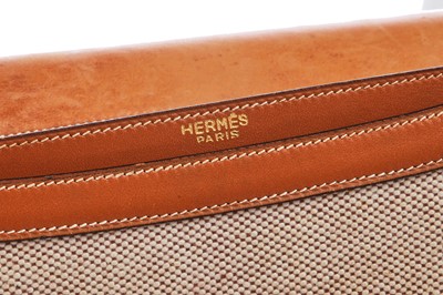Lot 53 - An Hermès canvas and natural leather shoulder bag, 1960s