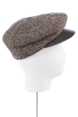 Lot 62 - An Hermès herringbone tweed flat cap, modern