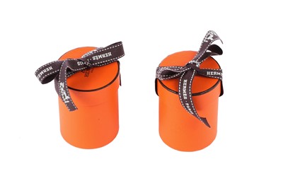Lot 59 - Two Hermès printed silk Twillies, modern