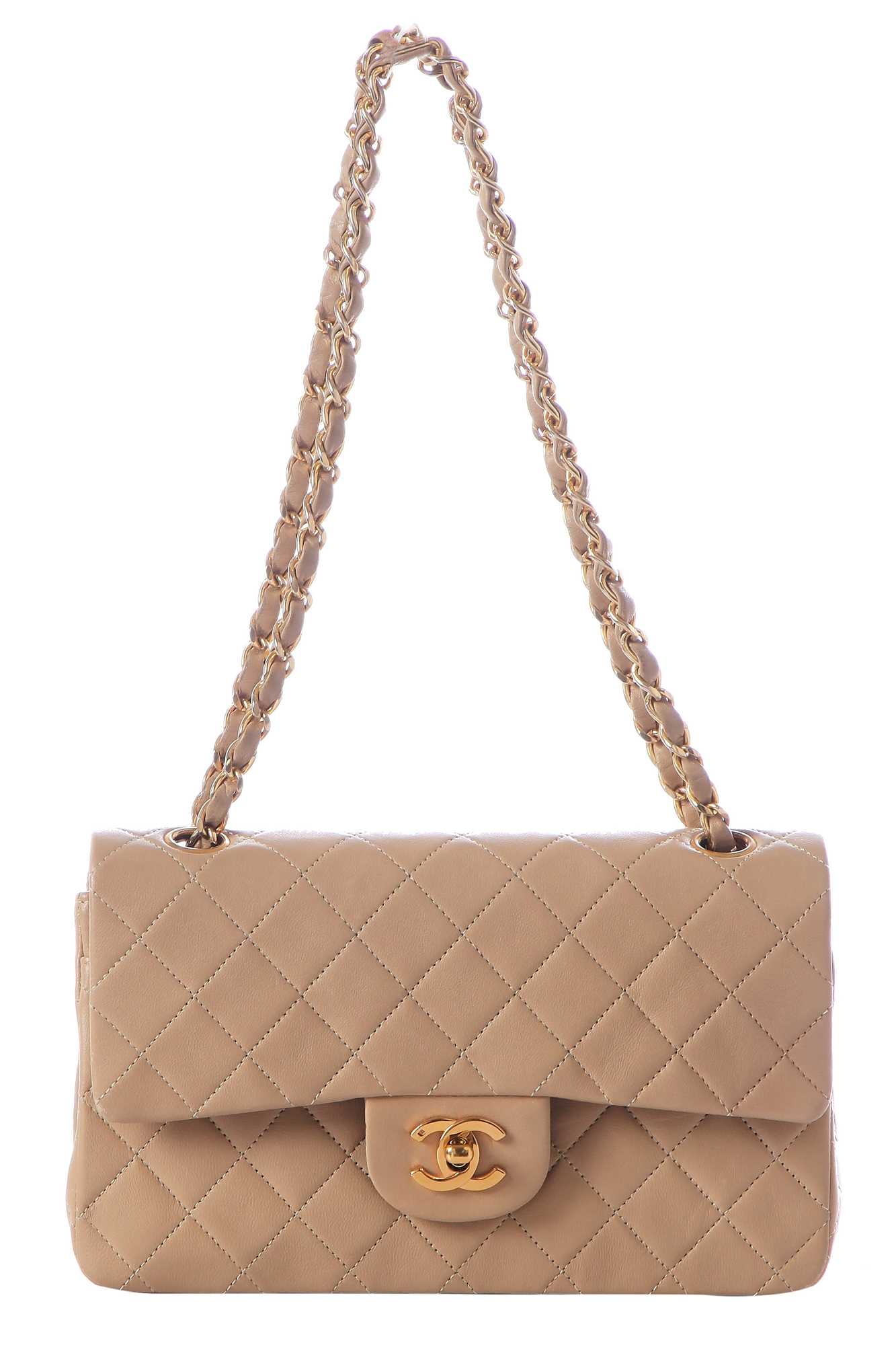 Lot 5 - A Chanel quilted beige leather classic double-flap bag, 1989-91