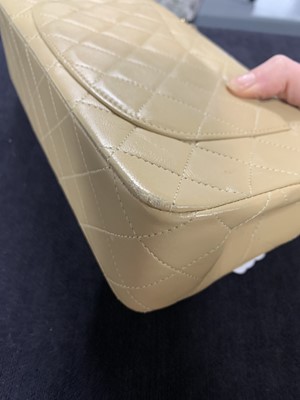 Lot 5 - A Chanel quilted beige leather classic double-flap bag, 1989-91
