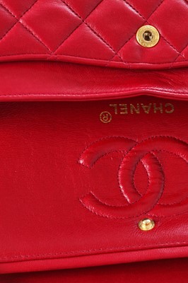 Lot 2 - A Chanel quilted red lambskin leather classic double-flap bag, 1991-94