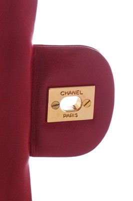 Lot 2 - A Chanel quilted red lambskin leather classic double-flap bag, 1991-94