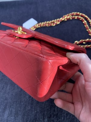 Lot 2 - A Chanel quilted red lambskin leather classic double-flap bag, 1991-94