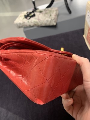 Lot 2 - A Chanel quilted red lambskin leather classic double-flap bag, 1991-94