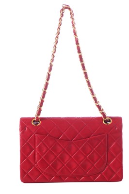 Lot 2 - A Chanel quilted red lambskin leather classic double-flap bag, 1991-94