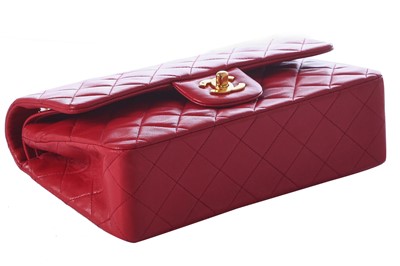 Lot 2 - A Chanel quilted red lambskin leather classic double-flap bag, 1991-94