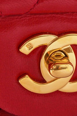 Lot 2 - A Chanel quilted red lambskin leather classic double-flap bag, 1991-94