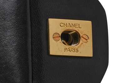 Lot 10 - A Chanel quilted black lambskin leather classic double-flap bag, 1994-96