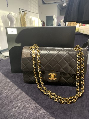 Lot 10 - A Chanel quilted black lambskin leather classic double-flap bag, 1994-96