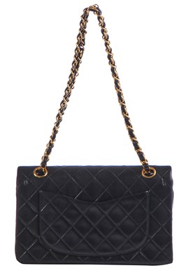 Lot 10 - A Chanel quilted black lambskin leather classic double-flap bag, 1994-96