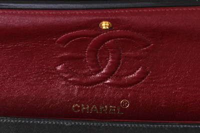 Lot 10 - A Chanel quilted black lambskin leather classic double-flap bag, 1994-96
