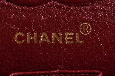 Lot 10 - A Chanel quilted black lambskin leather classic double-flap bag, 1994-96