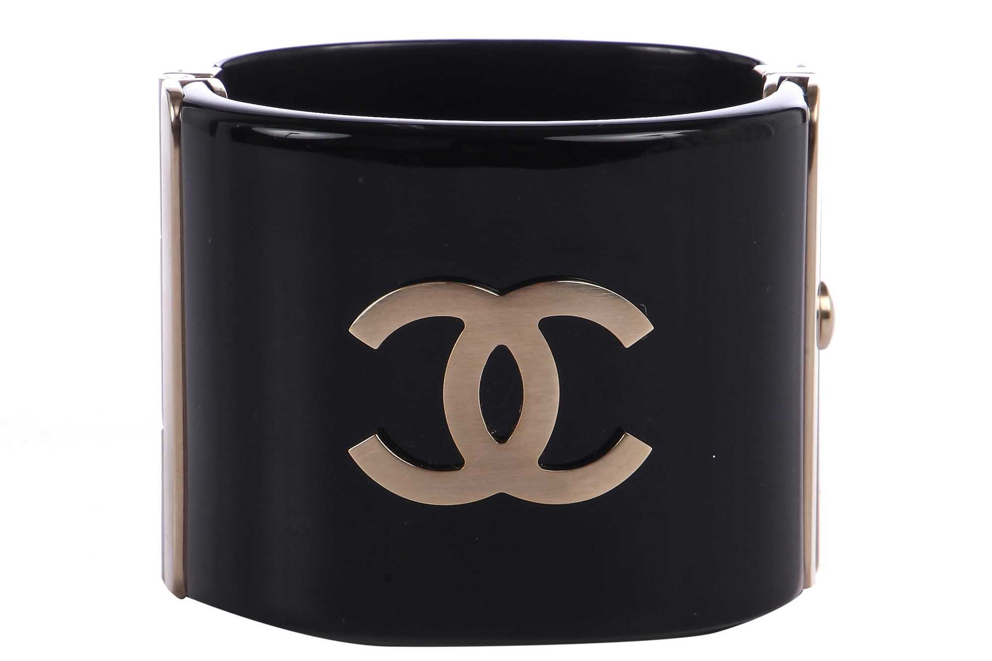 Lot 35 - A Chanel black resin cuff, Spring 2014
