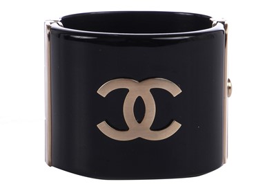Lot 35 - A Chanel black resin cuff, Spring 2014