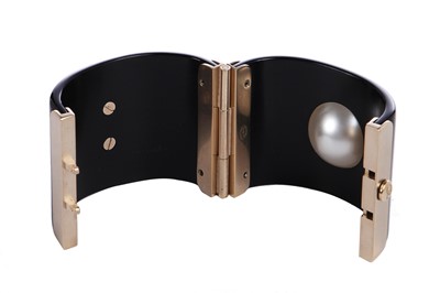 Lot 35 - A Chanel black resin cuff, Spring 2014