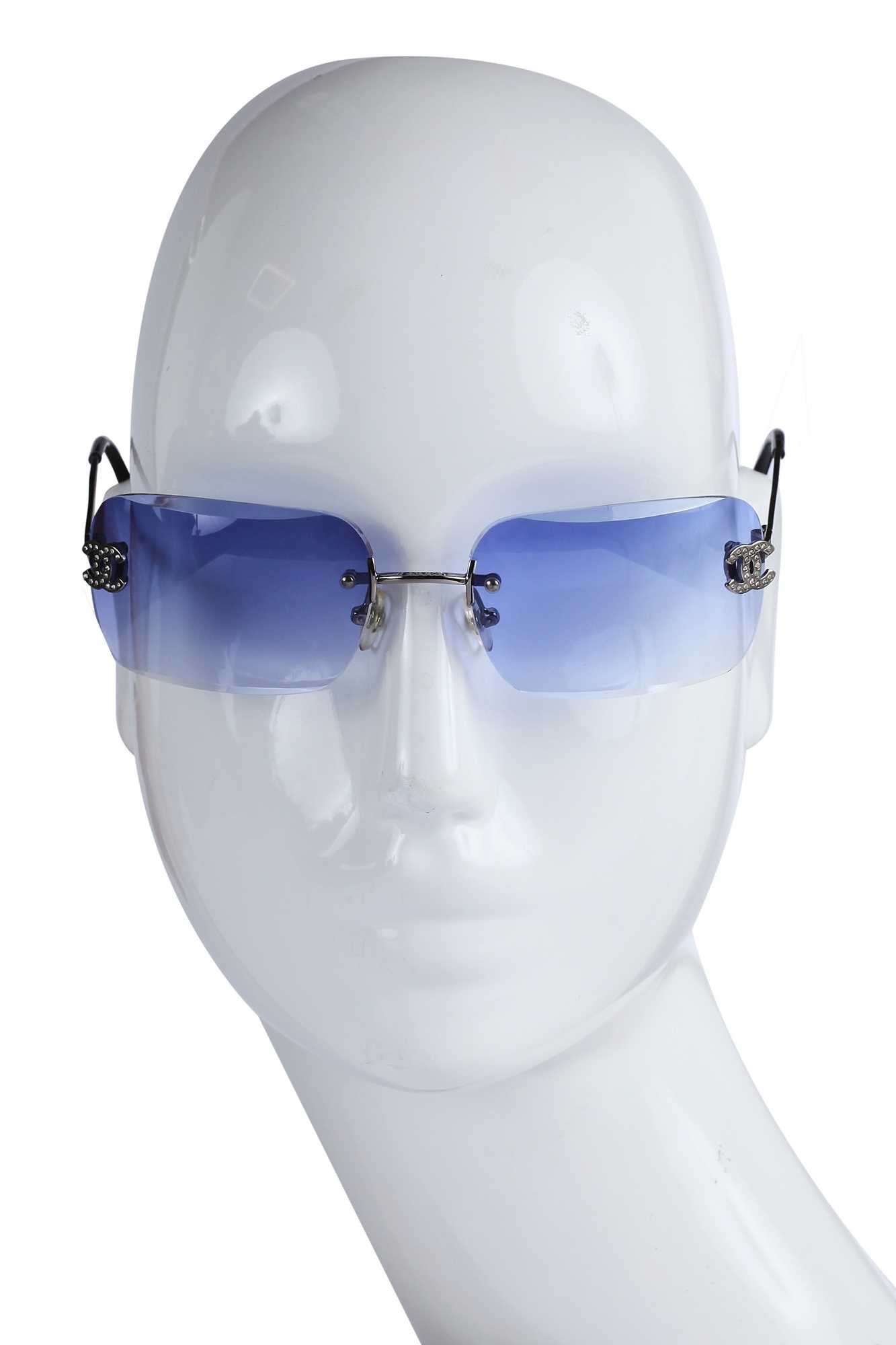 Lot 41 - Two pairs of Chanel sunglasses, 2000s