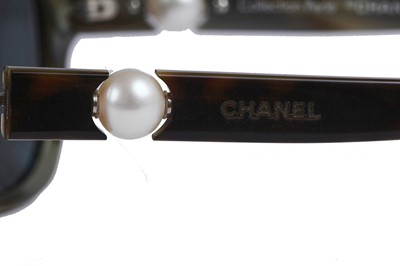 Lot 41 - Two pairs of Chanel sunglasses, 2000s