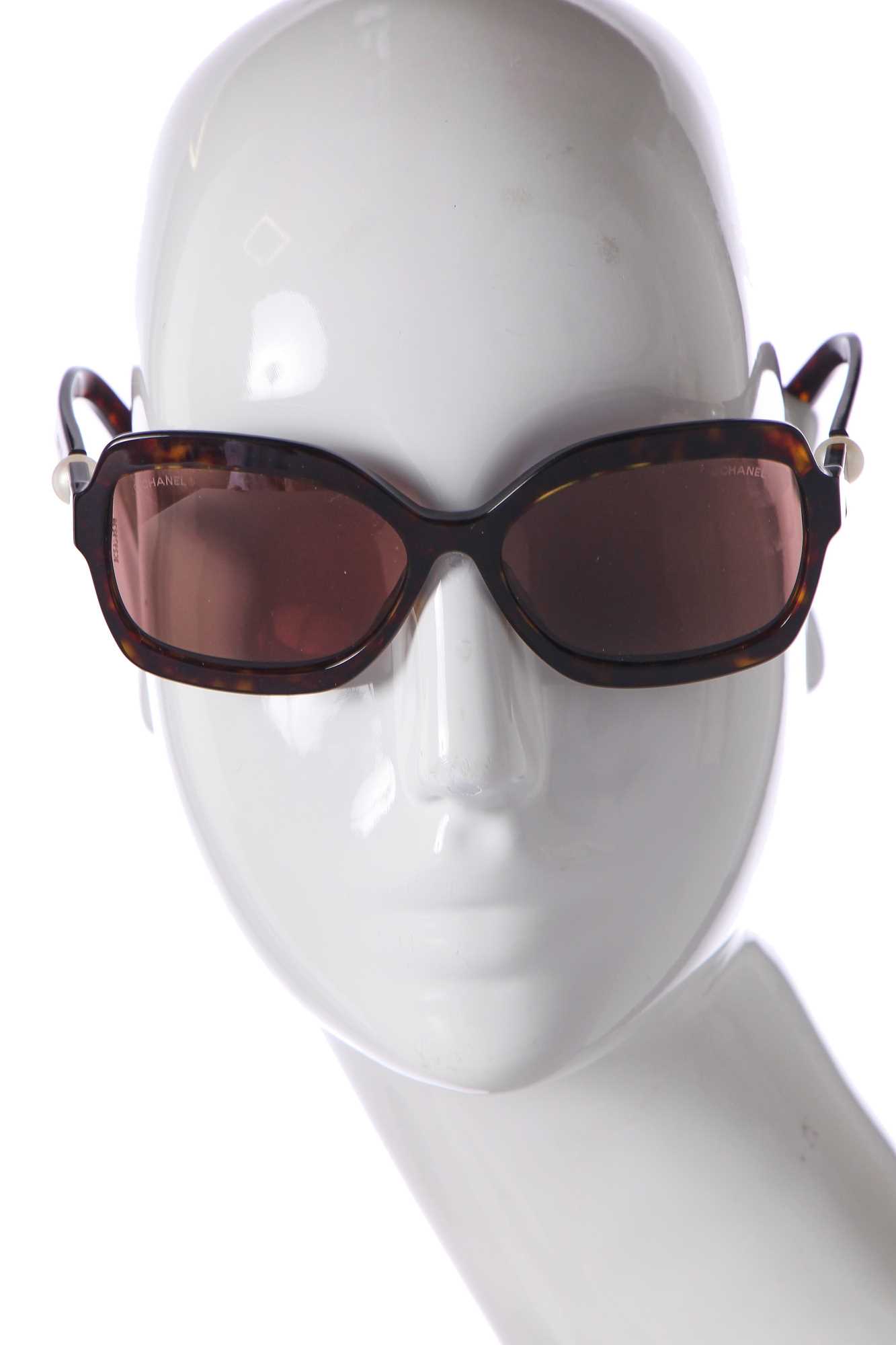 Lot 40 - Two pairs of Chanel sunglasses, 2000s