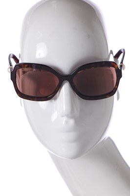 Lot 40 - Two pairs of Chanel sunglasses, 2000s