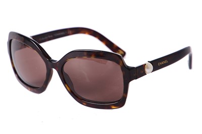 Lot 40 - Two pairs of Chanel sunglasses, 2000s