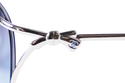 Lot 40 - Two pairs of Chanel sunglasses, 2000s