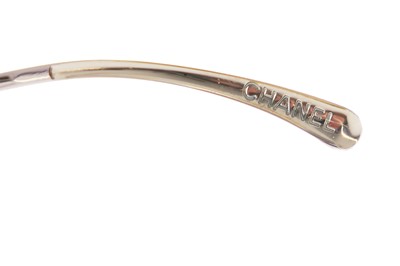 Lot 40 - Two pairs of Chanel sunglasses, 2000s