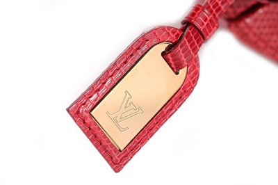 Lot 97 - A Louis Vuitton 'Ophelie' red lizard skin...