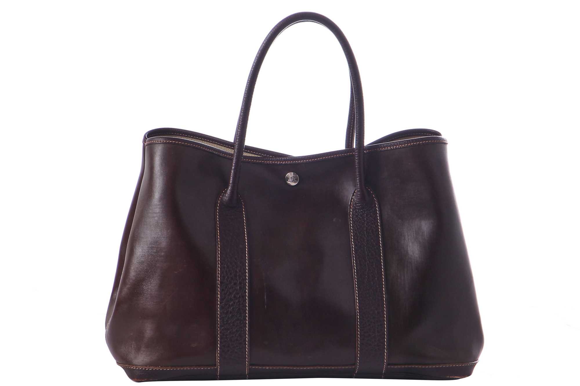 Lot 51 - An Hermès dark brown leather Garden Party Tote, modern