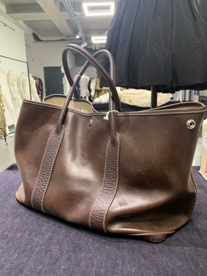 Lot 51 - An Hermès dark brown leather Garden Party Tote, modern