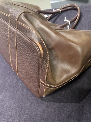 Lot 51 - An Hermès dark brown leather Garden Party Tote, modern