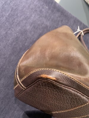 Lot 51 - An Hermès dark brown leather Garden Party Tote, modern