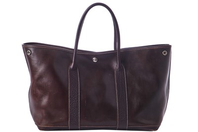 Lot 51 - An Hermès dark brown leather Garden Party Tote, modern