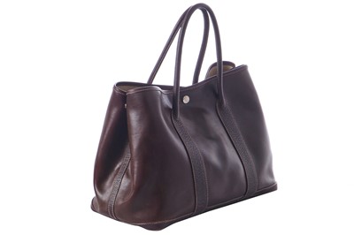 Lot 51 - An Hermès dark brown leather Garden Party Tote, modern