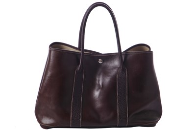Lot 51 - An Hermès dark brown leather Garden Party Tote, modern