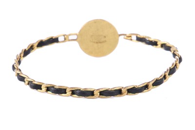 Lot 37 - A Chanel woven leather gilt chain bracelet, 1995