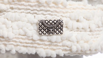Lot 15 - A Chanel white fantasy tweed and silver lace ensemble, Spring-Summer 2009