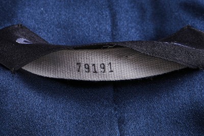 Lot 25 - A Chanel couture navy satin cocktail gown and matching coat, early 1970s