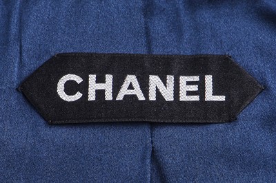 Lot 25 - A Chanel couture navy satin cocktail gown and matching coat, early 1970s