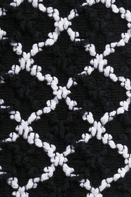 Lot 16 - A Chanel black and white tweed ensemble, Spring-Summer 2009
