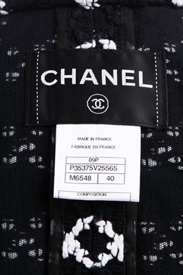 Lot 16 - A Chanel black and white tweed ensemble, Spring-Summer 2009