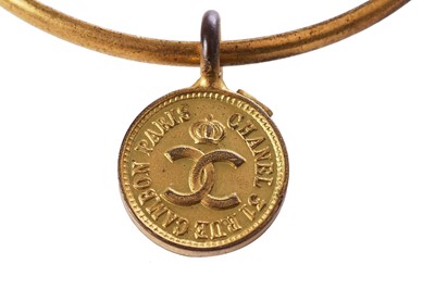 Lot 38 - A Chanel bangle, 1995